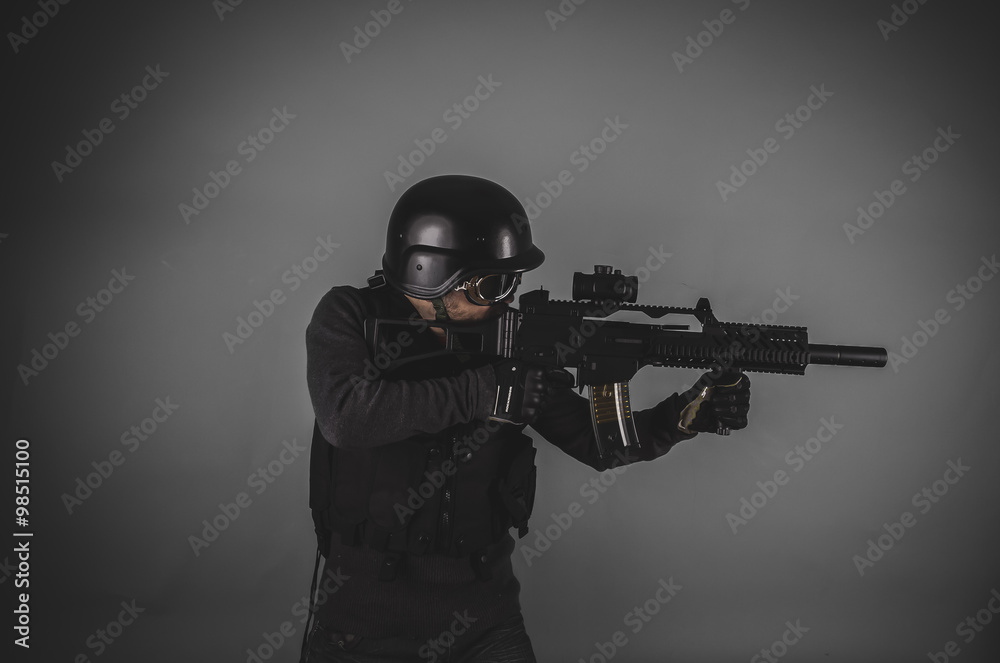 sniper, airsoft player with gun, helmet and bulletproof vest on sniper, airsoft player with gun, helmet and bulletproof vest on