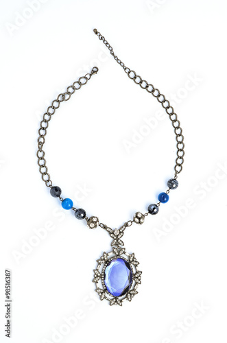pendant with precious stones on a white background