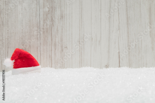 Red Santa hat in the snow