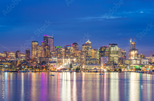 scenic view of Seattle city in the night time with reflection of © checubus