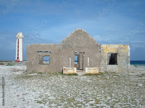 Willemstoren Lighthouse (built in 1837) and lighthouse keeper's house at southern point of Bonaire, Caribbean photo