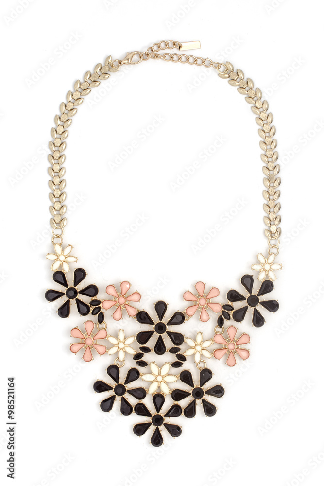 gold necklace with flowers isolated on white gold necklace with flowers isolated on white