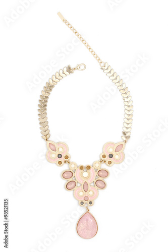 gold necklace with pink stones isolated on white