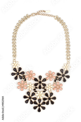 gold necklace with flowers isolated on white