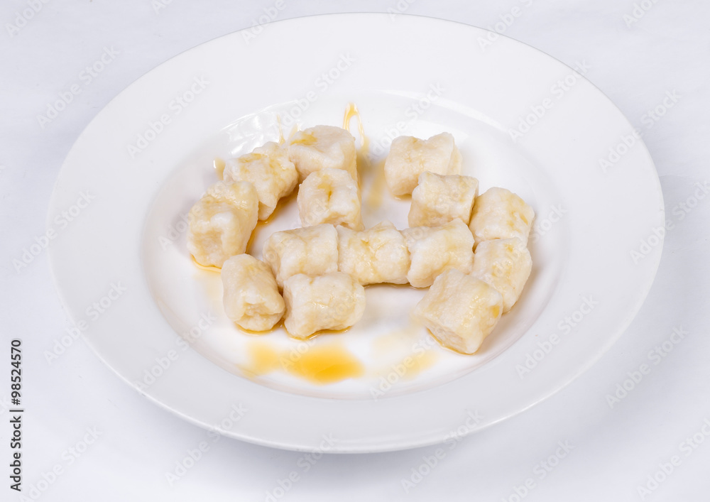 Lazy dumplings of cottage cheese with sour cream