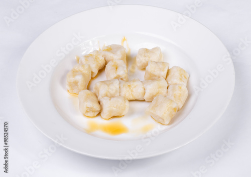 Lazy dumplings of cottage cheese with sour cream