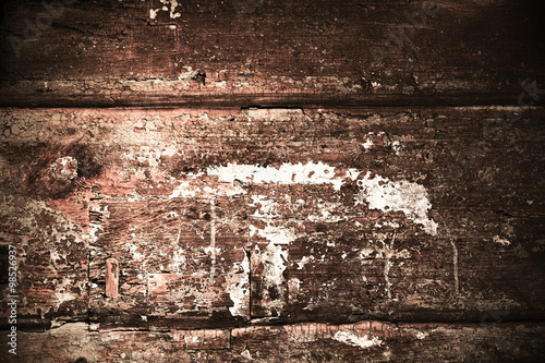 Texture of cracked rough wood surface painted