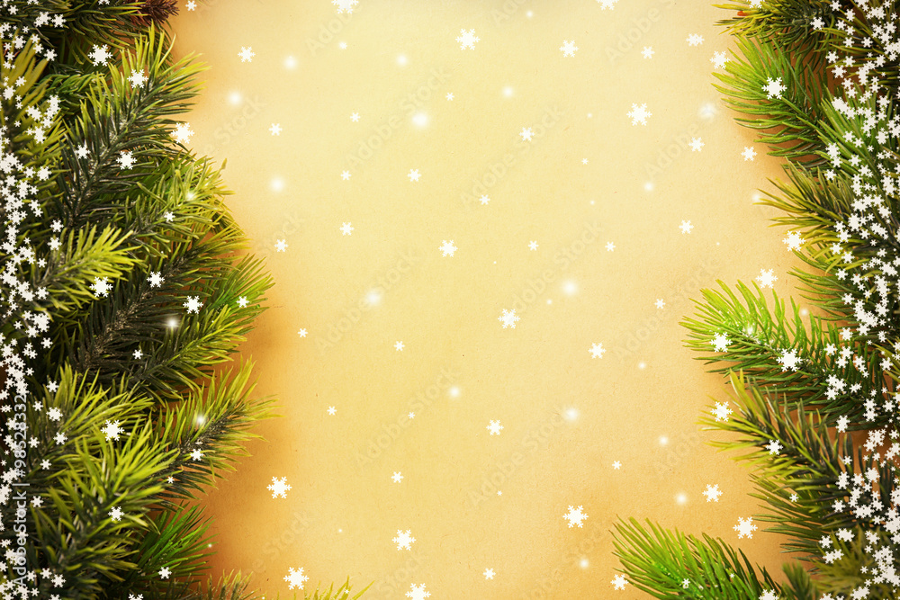 Christmas fir tree branches on paper background Christmas fir tree branches on paper background