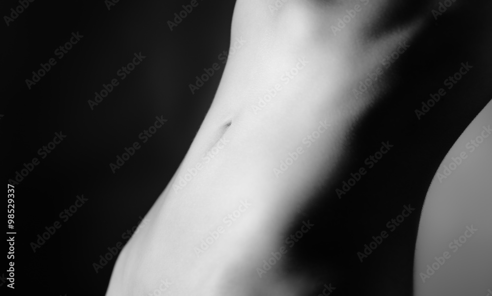 Naklejka premium Abstract nude of a woman abdomen