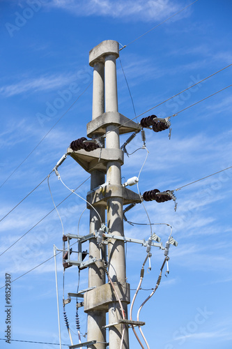 Concrete electrical line tower during sunny day, Uruguay