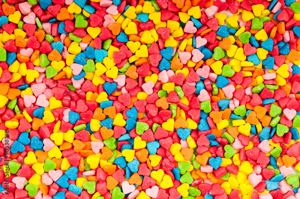 Colorful hearts sprinkles background. Valentines day decorations. 