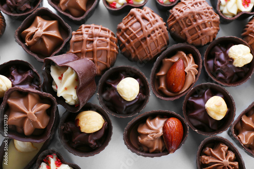 Delicious chocolate candies background, close up