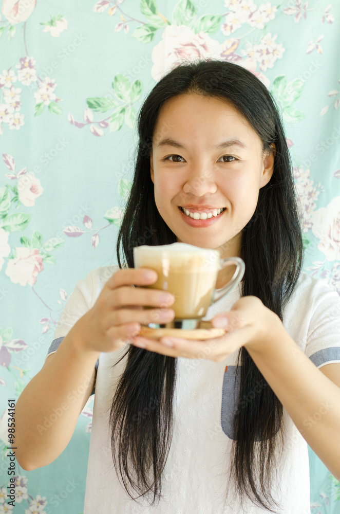 Young asian woman drinking hot coffee in the morning Young asian woman drinking hot coffee in the morning