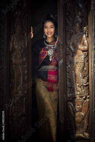 Asian woman in traditional dress. Beautiful woman dressed in silk.