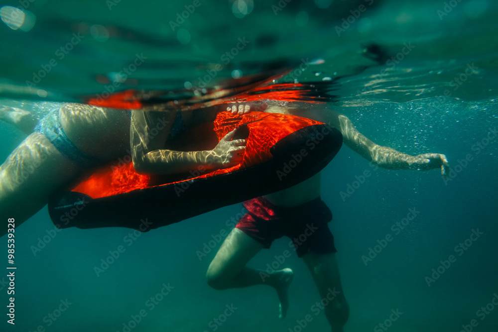 Fototapeta premium underwater scooter seabob unidentified man dive