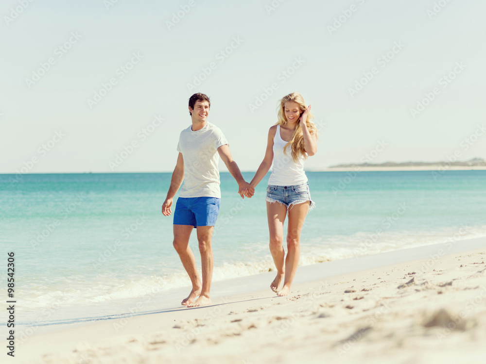 Romantic young couple on the beach Romantic young couple on the beach