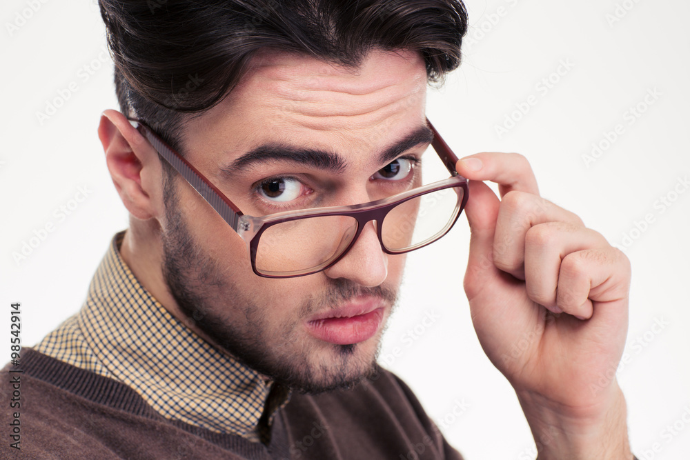 Handsome man in glasses looking at camera
