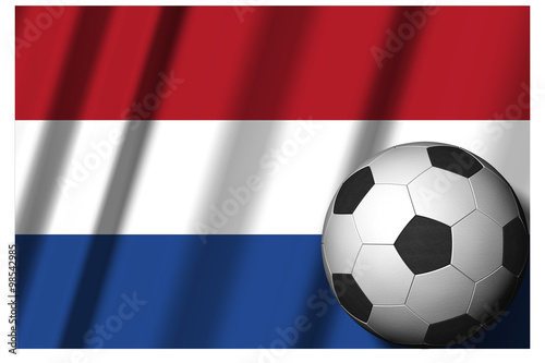 Calcio Europa_Paesi Bassi_001  Classica palla utilizzata nel gioco del calcio con  sullo sfondo  la bandiera nazionale.  