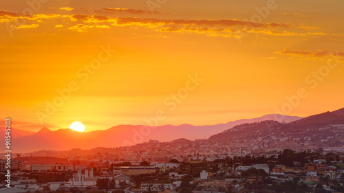 Beautiful Sunset Over Mountain and city