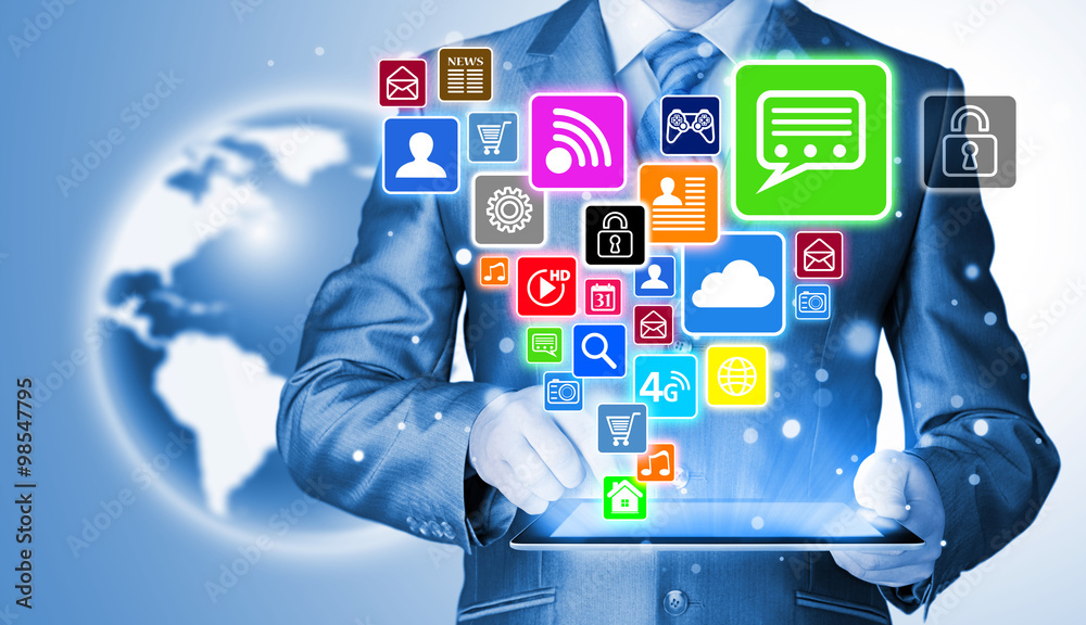 Business man using tablet PC with social media icon set