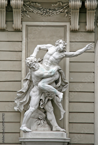 VIENNA, AUSTRIA - APRIL 23, 2010: Sculptures Hercules Wrestling Antaeus near the Hofburg Palace in Vienna, Austria