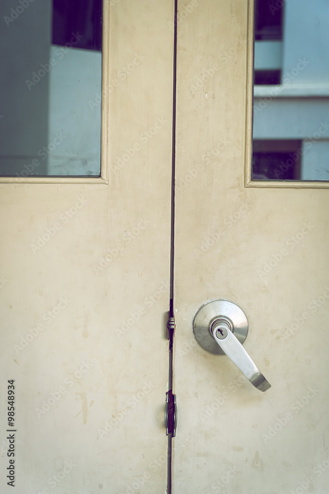metallic steel knob door handle lock the old white door
