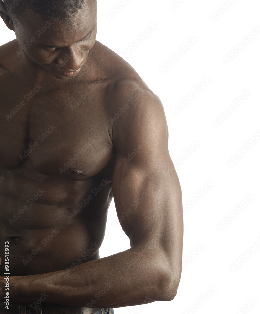 Fototapeta premium A black man with a muscular body and white background.