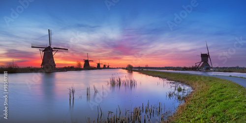 Traditional windmills at sunrise  Kinderdijk  The Netherlands