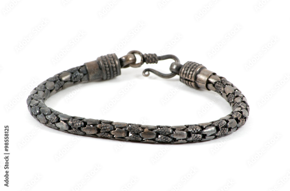 Silver bracelet over white Silver bracelet over white