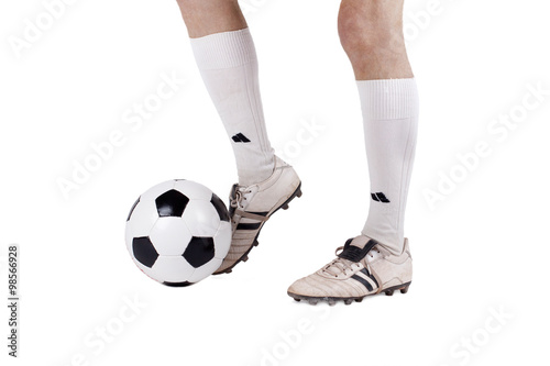 Fußballer mit Ball, isoliert  photo