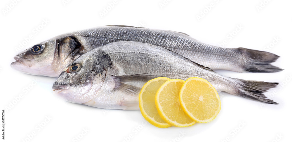 Fresh fish with lemon isolated on white background Fresh fish with lemon isolated on white background