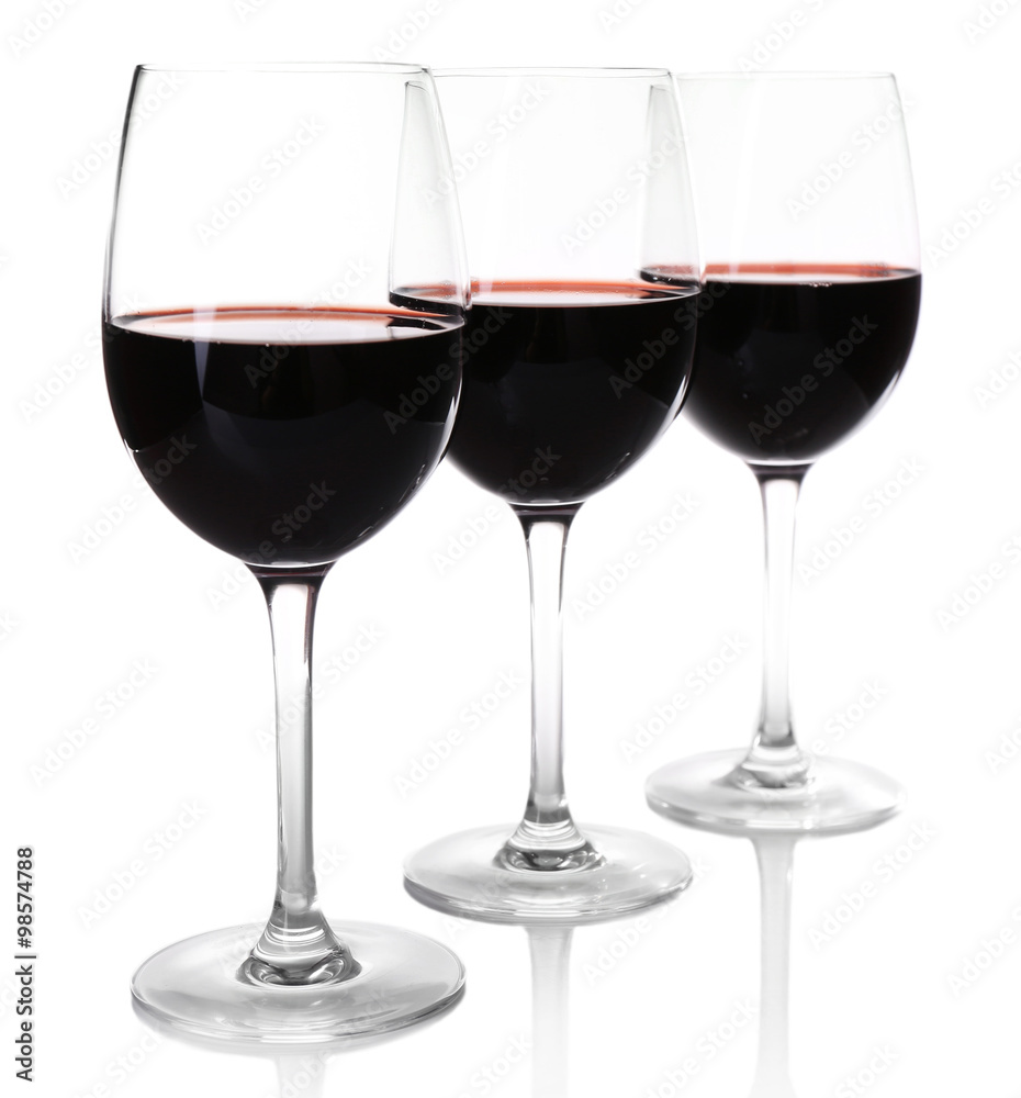 Three glasses of red wine on light background Three glasses of red wine on light background