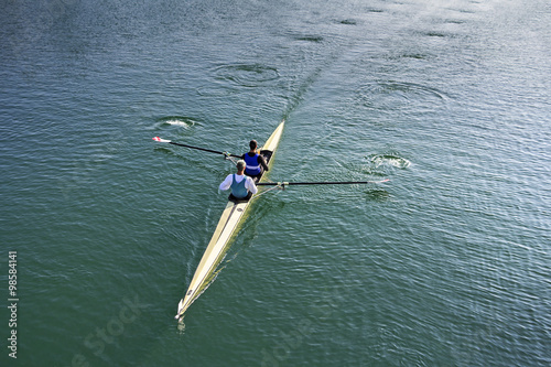 Two rowers in a boat