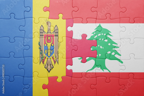 puzzle with the national flag of moldova and lebanon photo