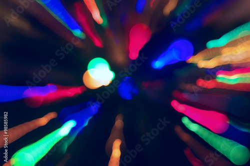 Abstract blurred background of Christmas lights and garlands.