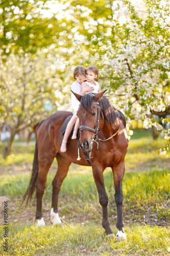 portrait of two girls of girlfriends on a summer nature © zagorodnaya