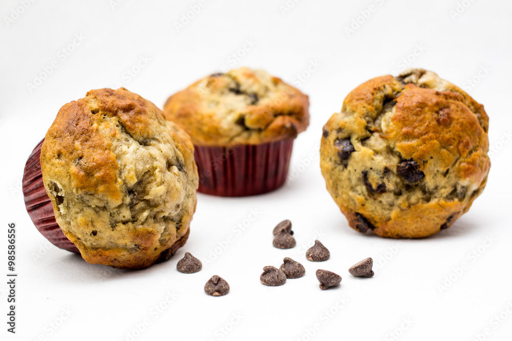 chocolate chips muffins on a white background chocolate chips muffins on a white background