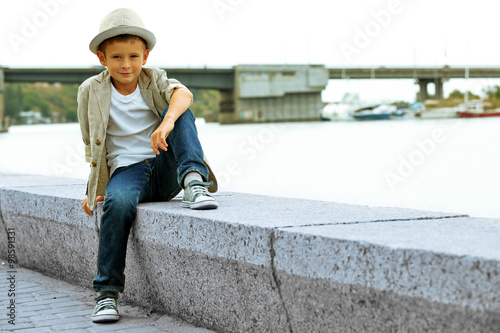 Little boy on the riverside