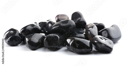 Black onyx pile isolated on white background