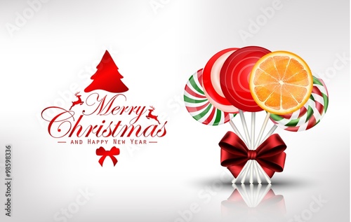 Christmas background with lollipop and orange slice