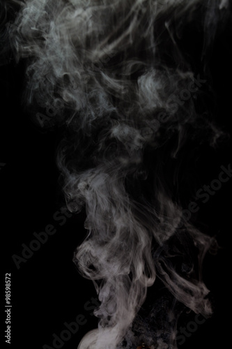 Fototapeta Naklejka Na Ścianę i Meble -  Abstract Smoke from rebuildable drip atomizer (RDA) on a black color background