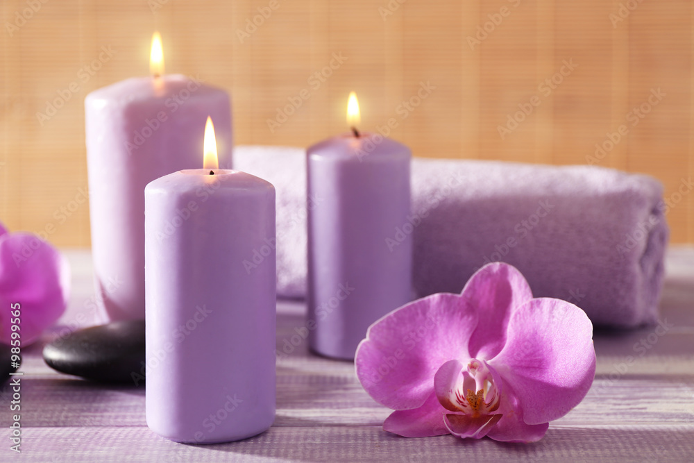 Spa set with flowers on wooden table Spa set with flowers on wooden table