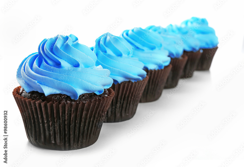 Delicious cupcakes isolated on white background Delicious cupcakes isolated on white background