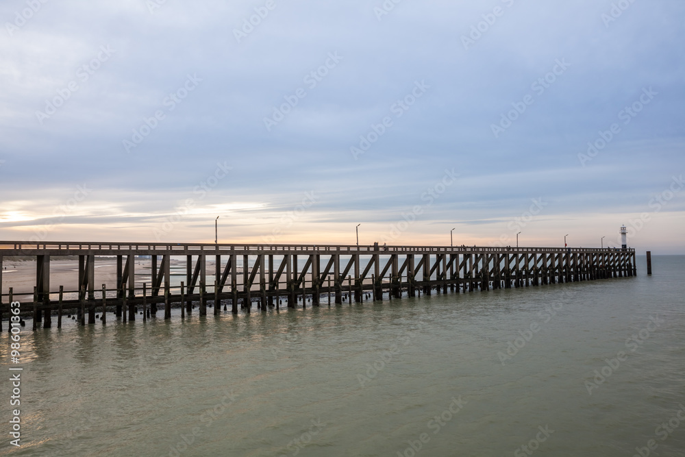 Fototapeta premium the pier whit light pole at the sea