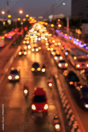 blurred of car on road with bokeh light in twilight time