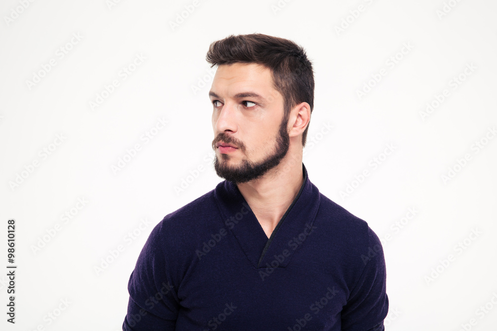 Potrait of attractive thoughtful young man with beard in sweetshirt Potrait of attractive thoughtful young man with beard in sweetshirt