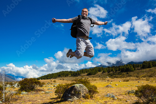 Man jumping on the background of the mountains of the Andes © oleg_mj