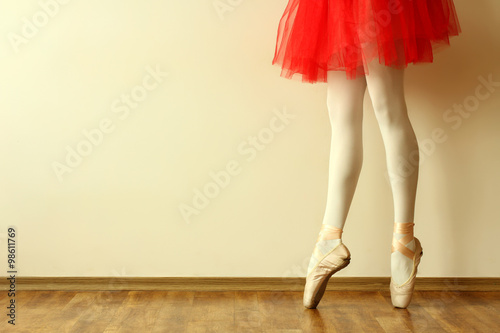 ballerina in Pointe on a wooden floor