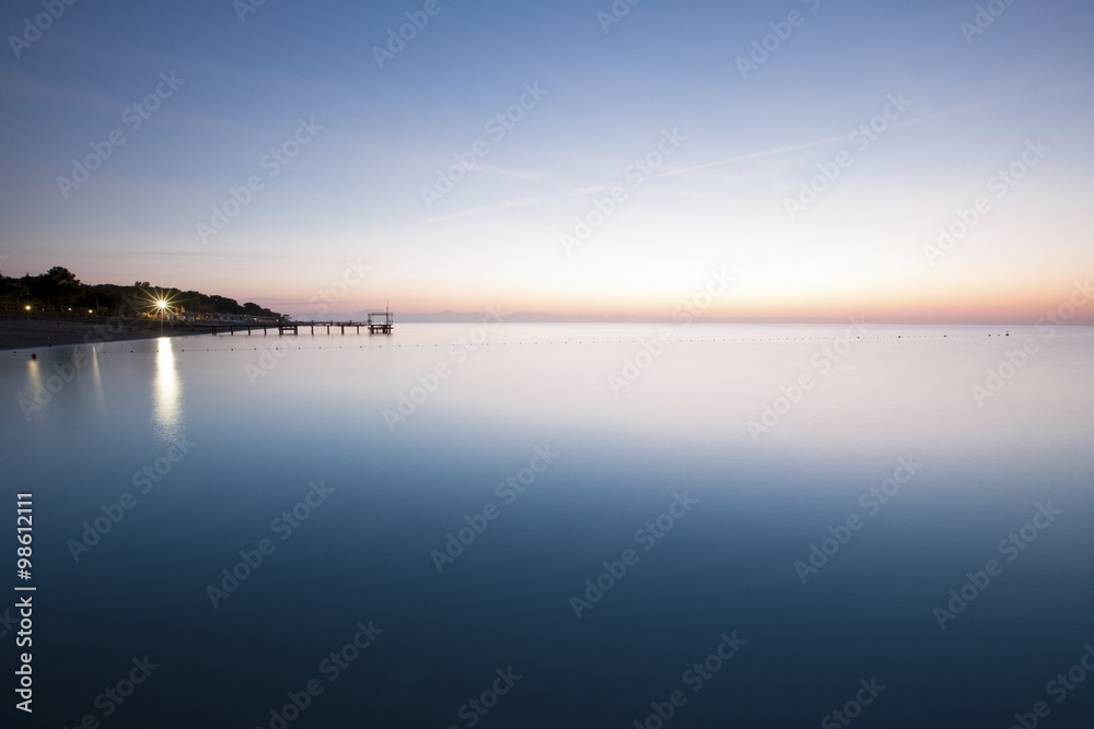 blue sea on pink and blue sky blue sea on pink and blue sky