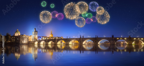 Obraz na plátně Charles Bridge and beautiful fireworks in Prague at night